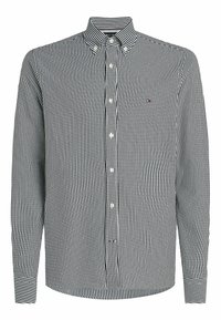 Camisa de manga larga a rayas negras y blancas con cuello abotonado, que presenta un pequeño logo en la parte superior izquierda y cierres de botones.