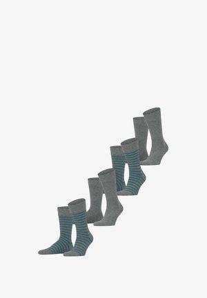 Grijze sokken met verschillende ontwerpen: effen grijs, donkergrijs met turquoise strepen, met geribbelde bovenkanten en een zachte textuur.