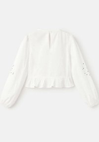 Biała krótka bluzka z długimi rękawami, falbanką na dole i wycięciem na plecach. Z subtelnymi zdobieniami na rękawie. Wykonana z miękkiego materiału.