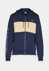 ZIPPED COLOURBLOCK HOODIE UNISEX - Cipzáras pulóver - navy blue/croissant