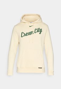 Kremna kapuca z zelenim napisom "Cream City", sprednja xepa, kapuca z vrvico in rebrasti manšeti. Narejena iz mehkega materiala.