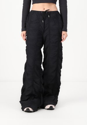 PARACHUTE PANTS  - Pantaloni - black
