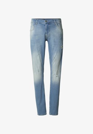Lichtblauwe distressed spijkerbroek met een geleidelijke vervaging, vijf zakken en een knoopsluiting. Voorzien van zichtbare scheuren en rafelige randen.
