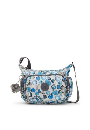Bolso de hombro con patrón abstracto azul y gris, bolsillo frontal con cremallera, correa ajustable y llavero pequeño de mono de peluche adjunto.
