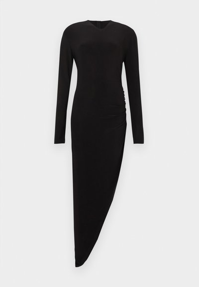 Μακρύ μαύρο ασύμμετρο φόρεμα με μακριά μανίκια και διακριτική ρυτίδωση στο πλάι, εφαρμοστ�ή σιλουέτα και μικρή λεπτομέρεια λαιμού σε σχήμα κλειδιού.