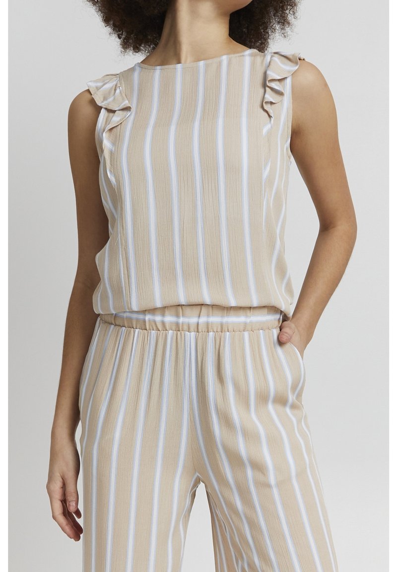 Top a righe beige con dettagli arricciati sulle spalle, caratterizzato da strisce azzurro chiaro, vestibilità rilassata e tessuto dalla texture liscia.