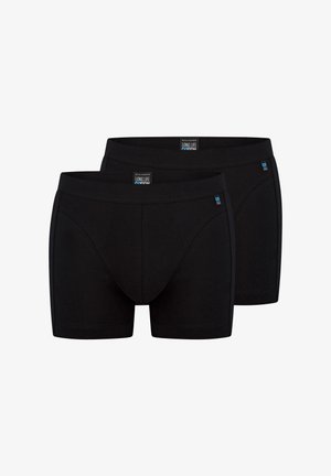 Boxer shorts in cotone nero con una texture liscia, dotati di una vita aderente e cuciture rifinite. Due paia esposti, entrambi con dettagli dell'etichetta.