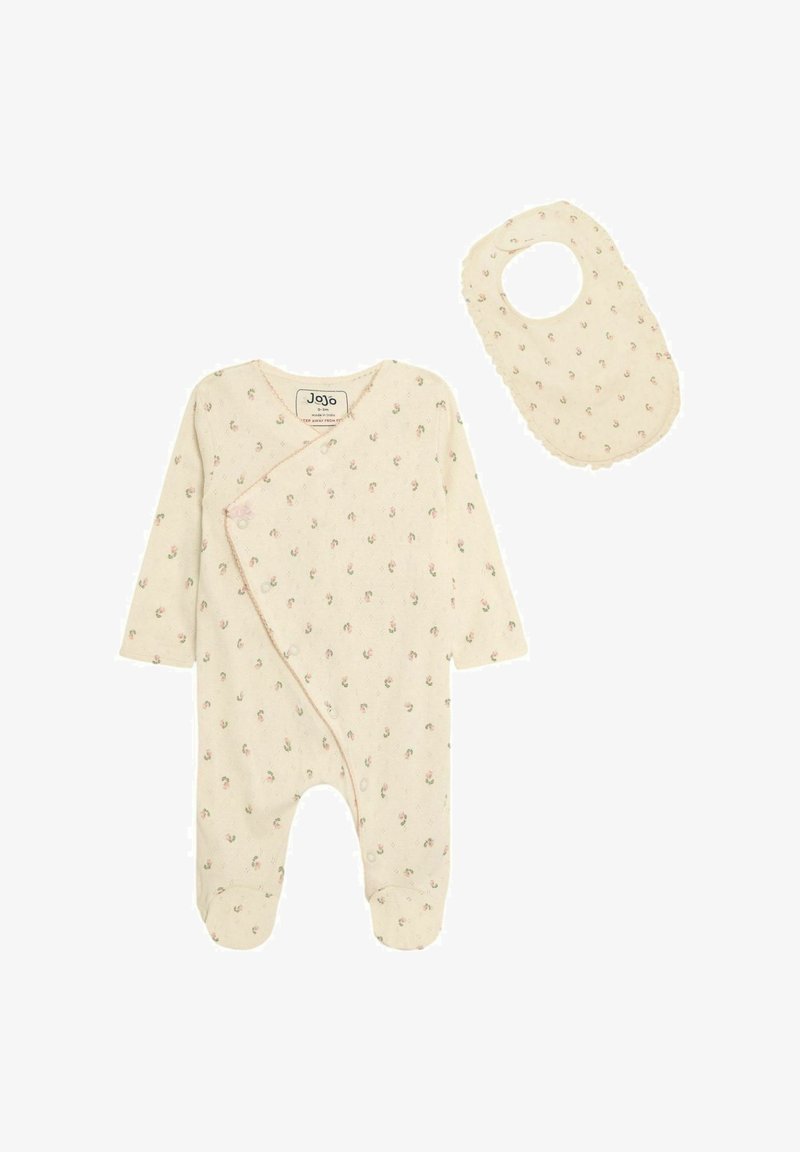 Cremefarvet babyoutfit med blomsterprint, der har lange ærmer, trykknapper og matchende smæk. Blødt stof med teksturerede detaljer.