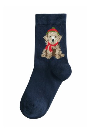 Marineblaue Baumwollsocke mit einem strukturierten, gestickten Hund, der einen roten Schal und einen grünen Hut trägt. Gerippter Bund mit einem einfarbigen Körper.