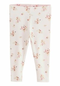 Blumenleggings aus geripptem Stoff mit einem hellrosa Hintergrund und kleinen, filigranen Blumenmustern in verschiedenen Rosa- und Goldtönen.