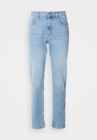 Lys blå denimjeans med rett ben-design, fem lommer og subtil falming. Har knappet lukking og beltestropper.