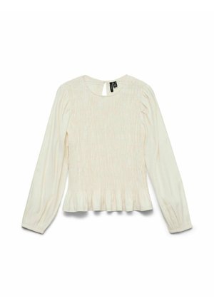 Kreminės spalvos palaidinė su ilgomis rankovėmis, raukšlėta tekstūra, apvali iškirptė ir raukiniai apačioje. Nugaroje yra raktelio formos detalė.