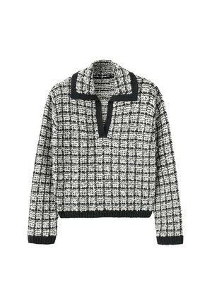 Jersey de punto a cuadros en blanco y negro con mangas largas, cuello en V y ribete negro en el cuello, puños y dobladillo.