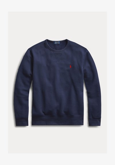 Laivastonsininen pitkähihainen pyöreäkauluksinen collegepaita, jossa on vasemmassa rinnassa punainen Polo Ralph Lauren -logo.