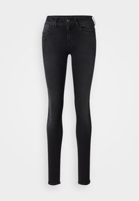 Jeans skinny negros de mezclilla, con una cintura alta, cinco bolsillos y una textura suave. Diseño simple sin adornos.