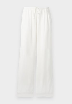 Witte, loszittende broek met elastische tailleband en trekkoord, rechte wijde pijpen, weergegeven tegen een effen lichte achtergrond.
