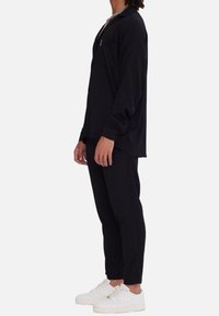 Megaman SET  - Stoffhose - schwarz