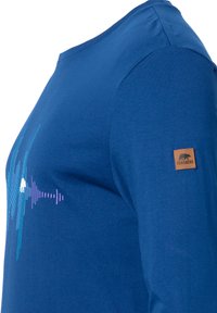 Langärmliges, blaues Hemd aus Baumwolle, mit einem Grafikdesign von Schallwellenlinien in Türkis und Lila sowie einem Logo-Patch aus braunem Leder.