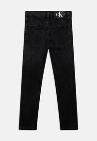 Calvin Klein Jeans SLIM WASHED - Vaqueros pitillo - black