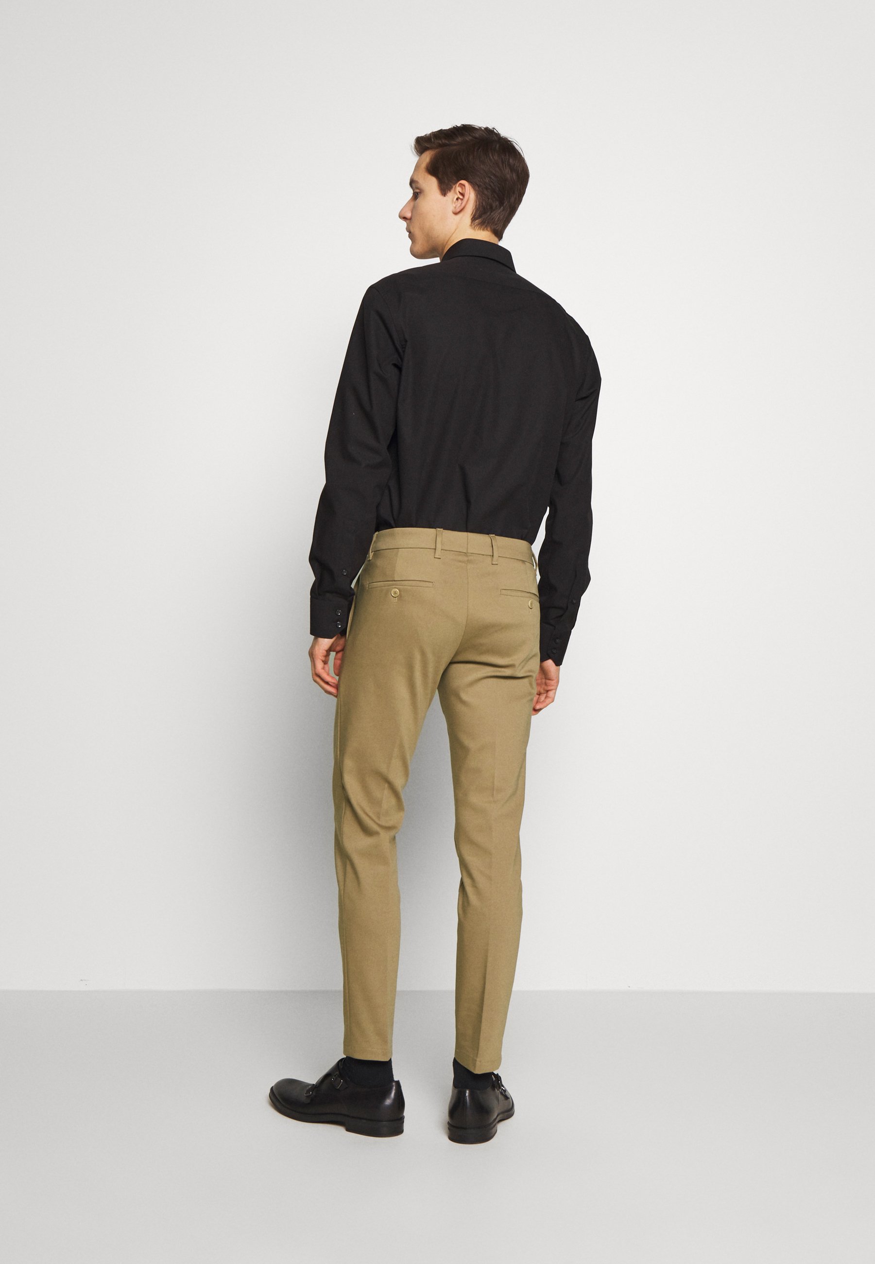 DRYKORN SIGHT Bukse beige Zalando.no McQ Alexander McQueen TROUSERS - Bukse - deep ink