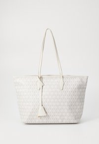White geometric-patterned tote bag with two handles and a textured finish. Features a small pendant detail at the zipper pull.
