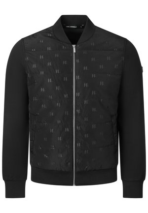 Schwarze Bomberjacke mit gesteppter Vorderseite und dezentem, sich wiederholendem Logomuster, geripptem Kragen, Bündchen, Saum und Frontreißverschluss.