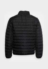 Black puffer jacket with a quilted design. Features long sleeves, a stand collar, and a smooth texture. No visible hardware.