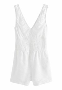 Combinaison sans manches blanche avec un décolleté en V, en tissu texturé, taille smockée et motifs géométriques sur l'ensemble.