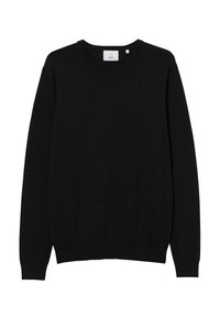 Maglione nero con collo rotondo, maniche lunghe e polsini e orlo a coste. Realizzato in un tessuto morbido, presenta un'etichetta sul collo.