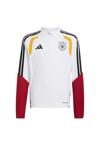 Biely športový dlhý rukáv s čiernymi a žltými akcentmi, červenými textúrovanými rukávmi, logom Adidas, erbom Nemeckej futbalovej federácie, polovičným zipsom na krku.