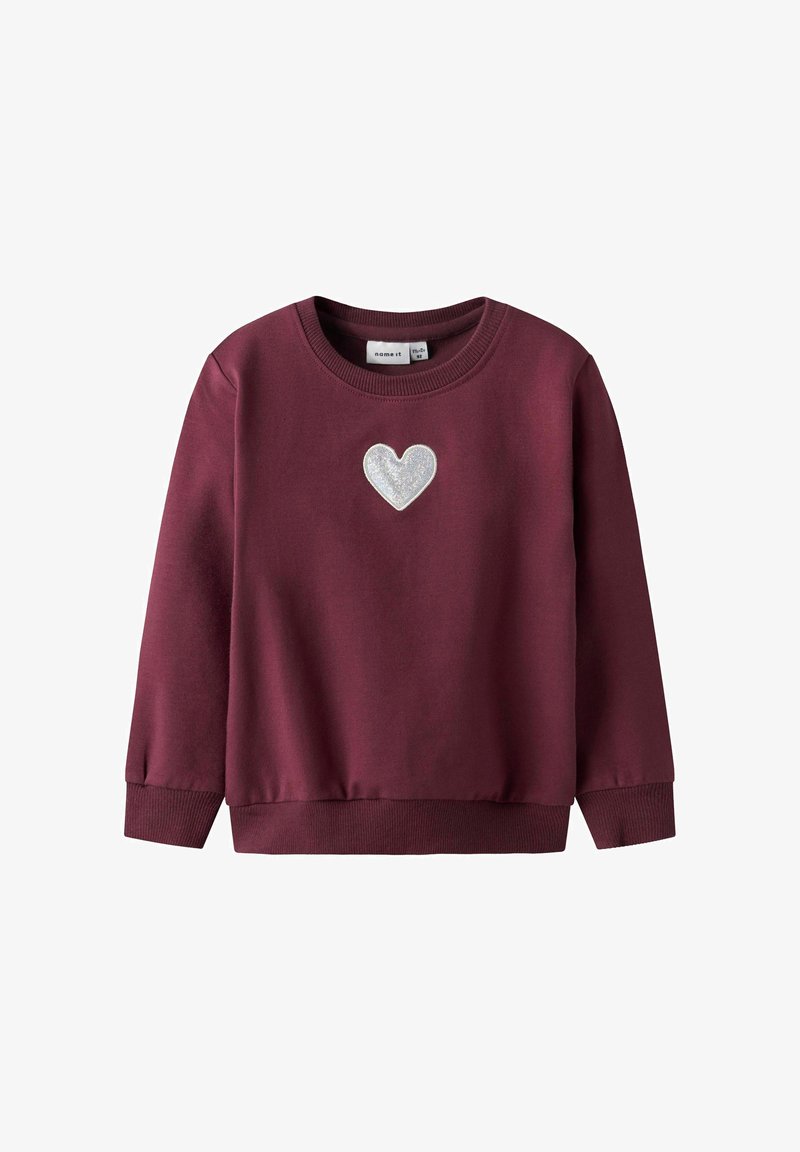 Burgundowa bluza z okrągłym dekoltem i długimi rękawami, z metaliczną aplikacją serca z przodu. Gładki, miękki materiał.