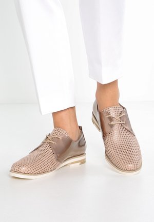 Marco Tozzi Sznurowane obuwie sportowe