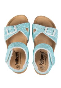 Sandales bleues pailletées avec deux brides ajustables, boucles blanches et semelle intérieure rembourrée. Doublure en tissu doux le long des bords.