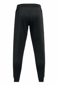 Svarta sweatpants i mjukt, elastiskt material, med tapered ben, elastisk midja och ribbade muddar vid anklarna.