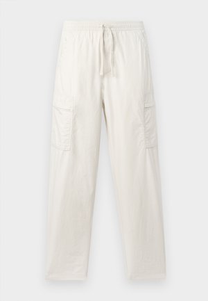 Light beige cargo pants made of cotton blend; featuring an elastic waistband, drawstring, and two side pockets for utility.
