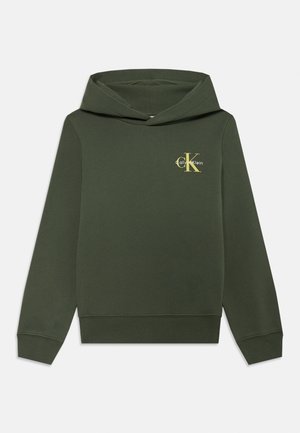 Grüne Kapuzenjacke aus einer Baumwollmischung. Verfügt über ein gelbes Logo auf der Vorderseite, gerippte Bündchen und Saum. Glatte Textur mit klassischer Passform.