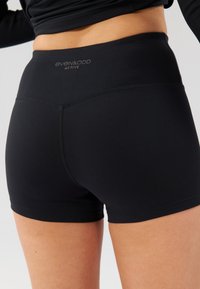 Even&Odd active ESSENTIAL MID RISE BOOTY SHORTS - Legingi - black