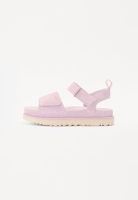 Rosa semskede sandaler med polstret såle, justerbar rem og teksturert overdel. Lett design med en løkke på hælen for enkel påkledning.
