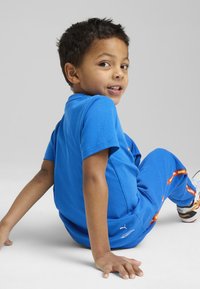 Puma - T-shirt z nadrukiem