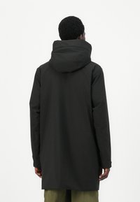 Helly Hansen MUNICH RAIN COAT UNISEX - Parka - black
