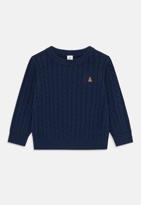 Navy blue cable knit sweater with a round neckline, long sleeves, and ribbed cuffs. Features a small embroidered bear logo on the chest.