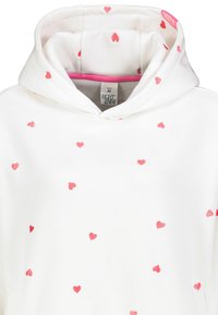 White hoodie made of soft fabric, featuring scattered small pink hearts. Includes a drawstring hood and a label inside the neckline.