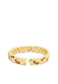 Guld kedjelänkarmband med växlande länkar som har små inlagda bärnstenfärgade stenar, visat utan lås på en vit bakgrund.