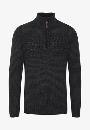 Dunkelgrauer Strickpullover mit hohem Kragen und kurzem Reißverschluss, der ein strukturiertes Muster und mehrfarbige Sprenkel aufweist.