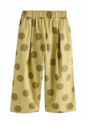 Hlače širokih nog z rumenim odtenkom in velikimi olivno zelenimi pikami, elastičnim pasom in stranskimi žepi.