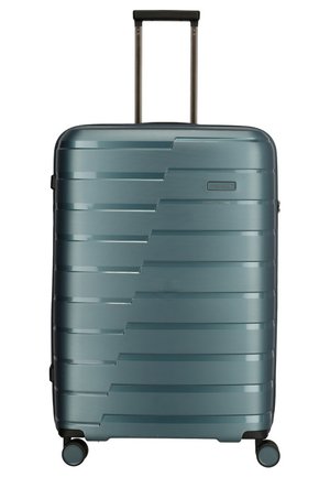Valigia rigida di colore teal con un design a strisce elegante. Dispone di un manico telescopico e quattro ruote per una facile mobilità.