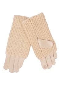 Beige Handschuhe mit weichen Stofffinger und dicken, gerippten Bündchen, wobei eines der Bündchen mit einem kleinen Stoffpatch und einer dekorativen Kleeblattstickerei versehen ist.