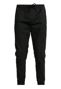 Czarne, lekkie spodnie dresowe z elastycznym pasem na sznurek, elastycznymi mankietami i gładką teksturą. Idealne na co dzień lub do ćwiczeń.
