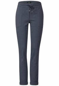 Marinblå joggerbyxor med texturerad tyg, elastisk midja, dragsko för stängning och två framfickor; design med avsmalnande ben.