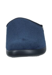 Pantofole blu navy con una morbida texture simile al camoscio, forma arrotondata e suola in gomma nera. Presentano un bordo superiore liscio e un design minimale.